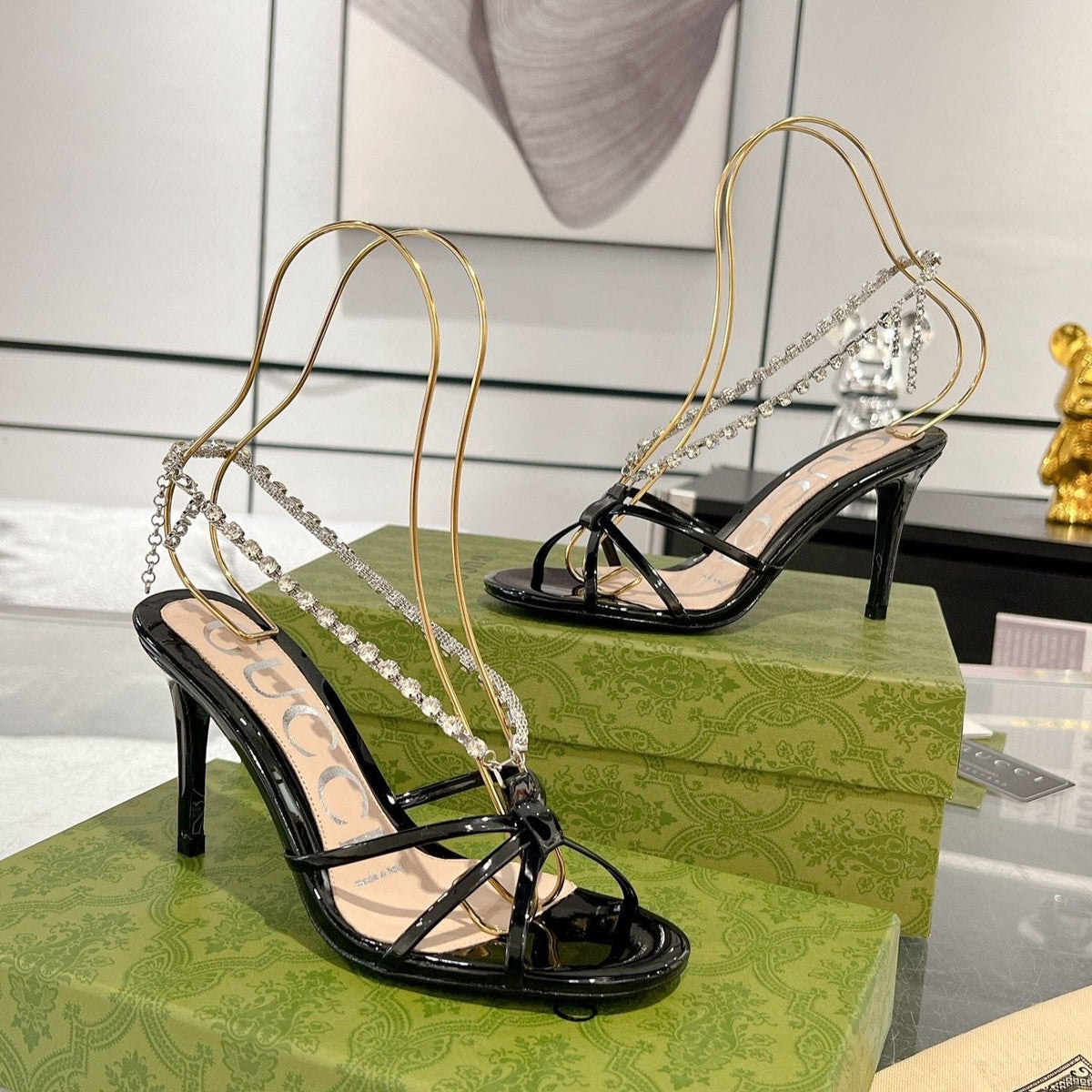 STRAPPY SANDAL WITH RHINESTONE CHAIN IN BLACK PATENT LEATHER