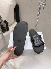 CELINE 26S TRIOMPHE SLIDES IN BLACK CALFSKIN