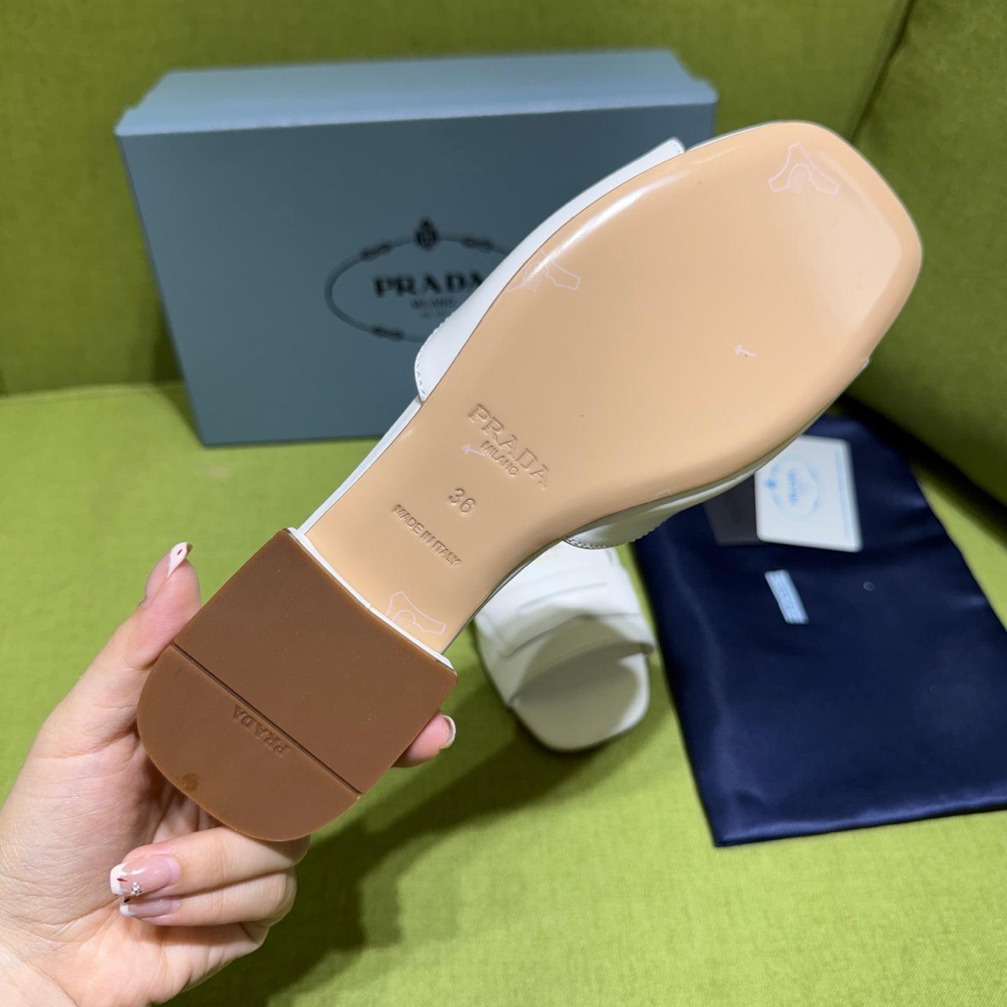 PRADA 25S SLIDES IN WHITE CALFSKIN