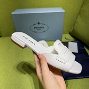 PRADA 25S SLIDES IN WHITE CALFSKIN