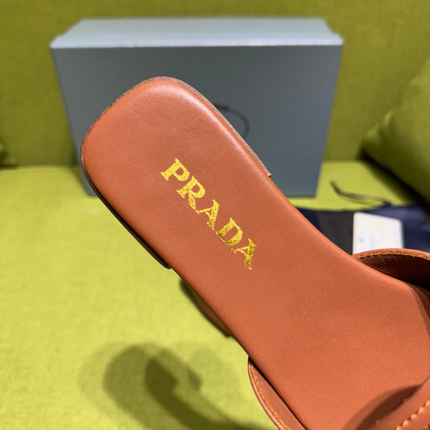 PRADA 25S SLIDES IN BROWN CALFSKIN