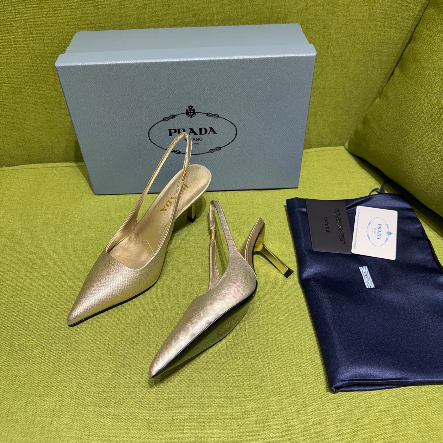PRADA 25S SLINGBACK HIGH HEELS 75 MM IN GOLD SHEEPSKIN