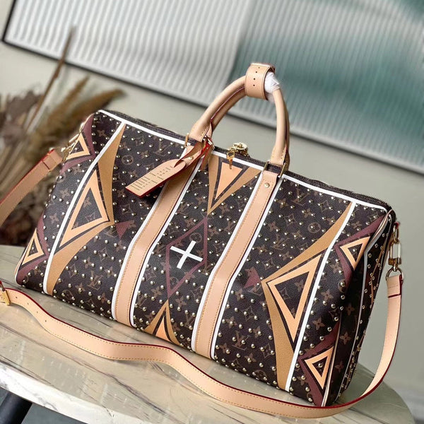 KEEPALL BANDOULIÈRE 50 IN PARFLECHE PATTERN MONOGRAM CANVAS