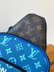 AVENUE SLINGBAG 31 IN BLUE AND BROWN TAIGA LEATHER