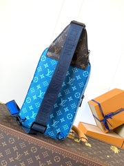 AVENUE SLINGBAG 31 IN BLUE AND BROWN TAIGA LEATHER