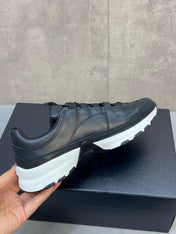 CHANEL 26S RUNNER CC LOGO SNEAKERS IN BLACK CALFSKIN