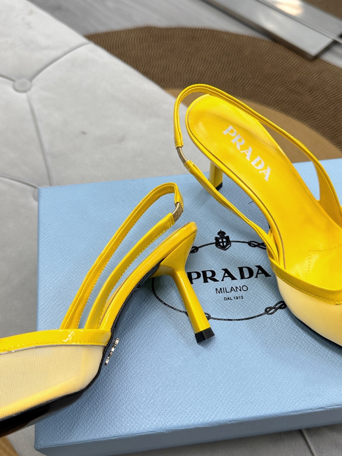 PRADA 25S TRIANGLE LOGO SLINGBACK PUMPS IN YELLOW MESH FABRIC