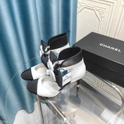 HIGH HEELS IN WHITE MIX BLACK SHEEPSKIN WITH FLOWER