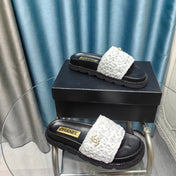 KNIT SLIPPERS IN LIGHT PINK WOVEN SATIN AND BLACK SHEEPSKIN