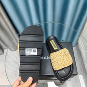 KNIT SLIPPERS IN DARK CREAM WOVEN SATIN AND BLACK SHEEPSKIN