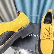 OXFORD SHOES IN GOLD YELLOW SUEDE AND BLACK SHEEPSKIN
