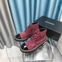 SHORT BOOTS IN MAGENTA PURPLE SUEDE AND BLACK SHEEPSKIN