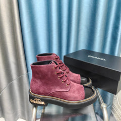 SHORT BOOTS IN MAGENTA PURPLE SUEDE AND BLACK SHEEPSKIN