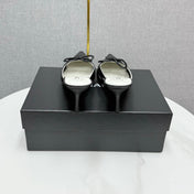 CC HEEL MULES 25S IN BLACK MESH FABRIC AND LAMBSKIN WITH BOW