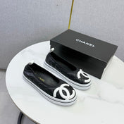 CHANEL 26S CC LOGO SLIP-ON SNEAKERS IN BLACK CALFSKIN
