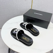 CHANEL 26S ICONIC CC SLIDES IN BLACK LAMBSKIN