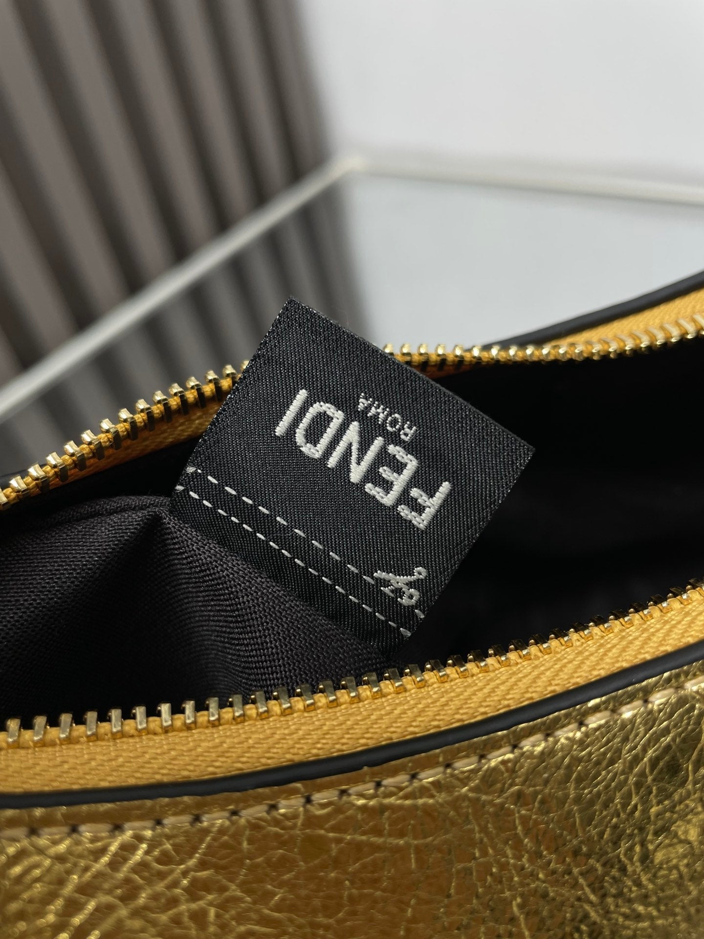 FENDIGRAPHY MEDIUM 29 IN GOLD METALLIC SMOOTH LAMBSKIN GOLD HARDWARE