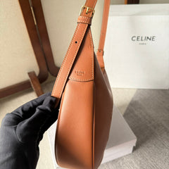 SMALL HELOÏSE BAG CUIR 22 IN GINGER ORANGE CALFSKIN EMBOSSED LOGO