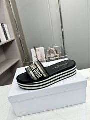 CD DWAY PLATFORM SLIDE IN BLACK AND WHITE COTTON STRIPED SOLE