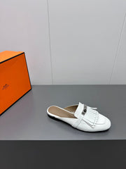 0Z MULE IN WHITE LAMBSKIN WITH FRINGE DETAIL