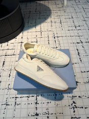 PRA TRIANGLE LOGO SNEAKERS WHITE CALFSKIN