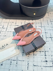 ALAIA FLAT SLINGBACK IN ROSE PINK PATENT CALFSKIN AND FILM