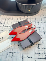 ALAIA FLAT SLINGBACK IN CHERRY RED PATENT CALFSKIN AND FILM