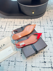 ALAIA FLAT SLINGBACK IN CHERRY RED PATENT CALFSKIN AND FILM