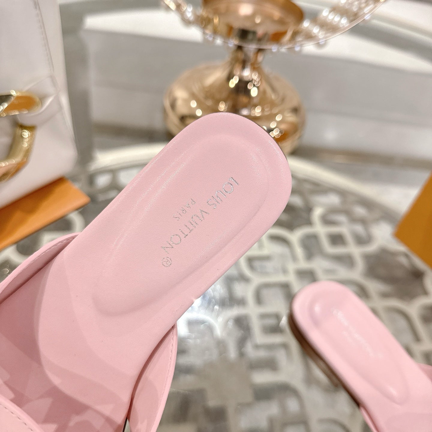 ISOLA FLAT SLIDE IN PASTEL PINK CALFSKIN