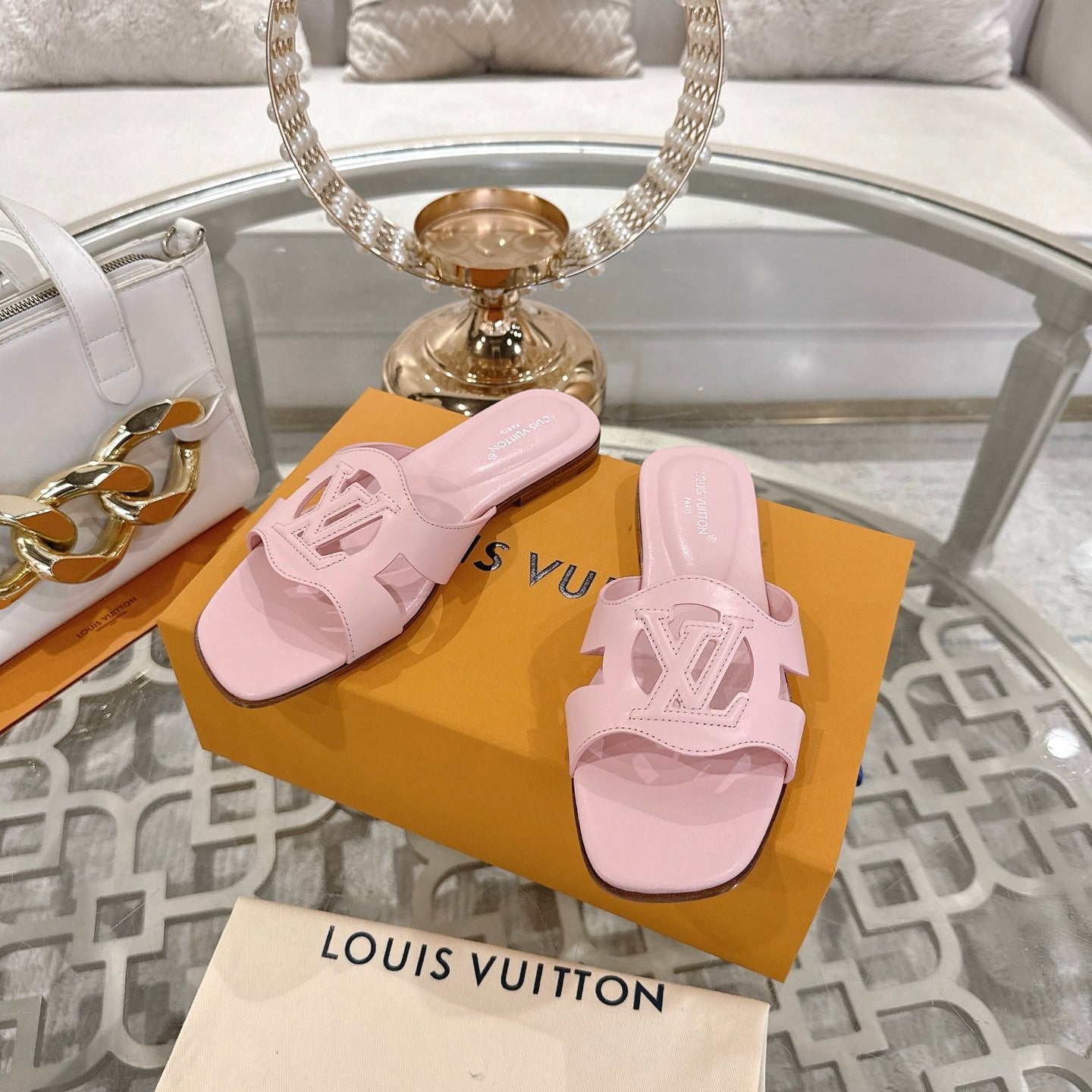 ISOLA FLAT SLIDE IN PASTEL PINK CALFSKIN