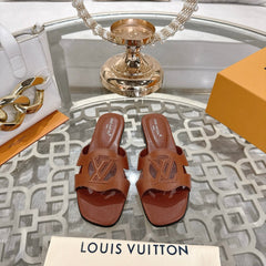 ISOLA FLAT SLIDE IN PENNY BROWN CALFSKIN