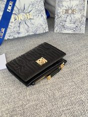 BIFOLD WALLET 11 IN BLACK QUILTED ALLOVER CALFSKIN