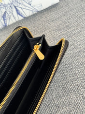 VERTICAL LONG ZIP WALLET 20 IN BLACK QUILTED ALLOVER CALFSKIN