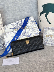 VERTICAL LONG ZIP WALLET 20 IN BLACK QUILTED ALLOVER CALFSKIN