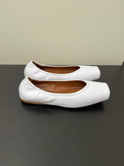 ALAIA BALLET FLATS IN WHITE SMOOTH CALFSKIN