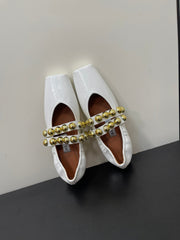 ALAIA BALLET FLATS IN WHITE GLOSSY CALFSKIN WITH GOLD HARDWARE
