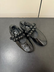 ALAIA SPHERE BALLET FLATS IN BLACK LAMBSKIN