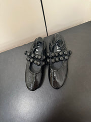 ALAIA SPHERE BALLET FLATS IN BLACK LAMBSKIN