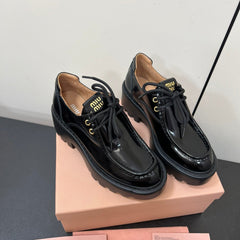 LACE-UP LOAFERS WITH THICK SOLE IN BLACK SHINY SHEEPSKIN