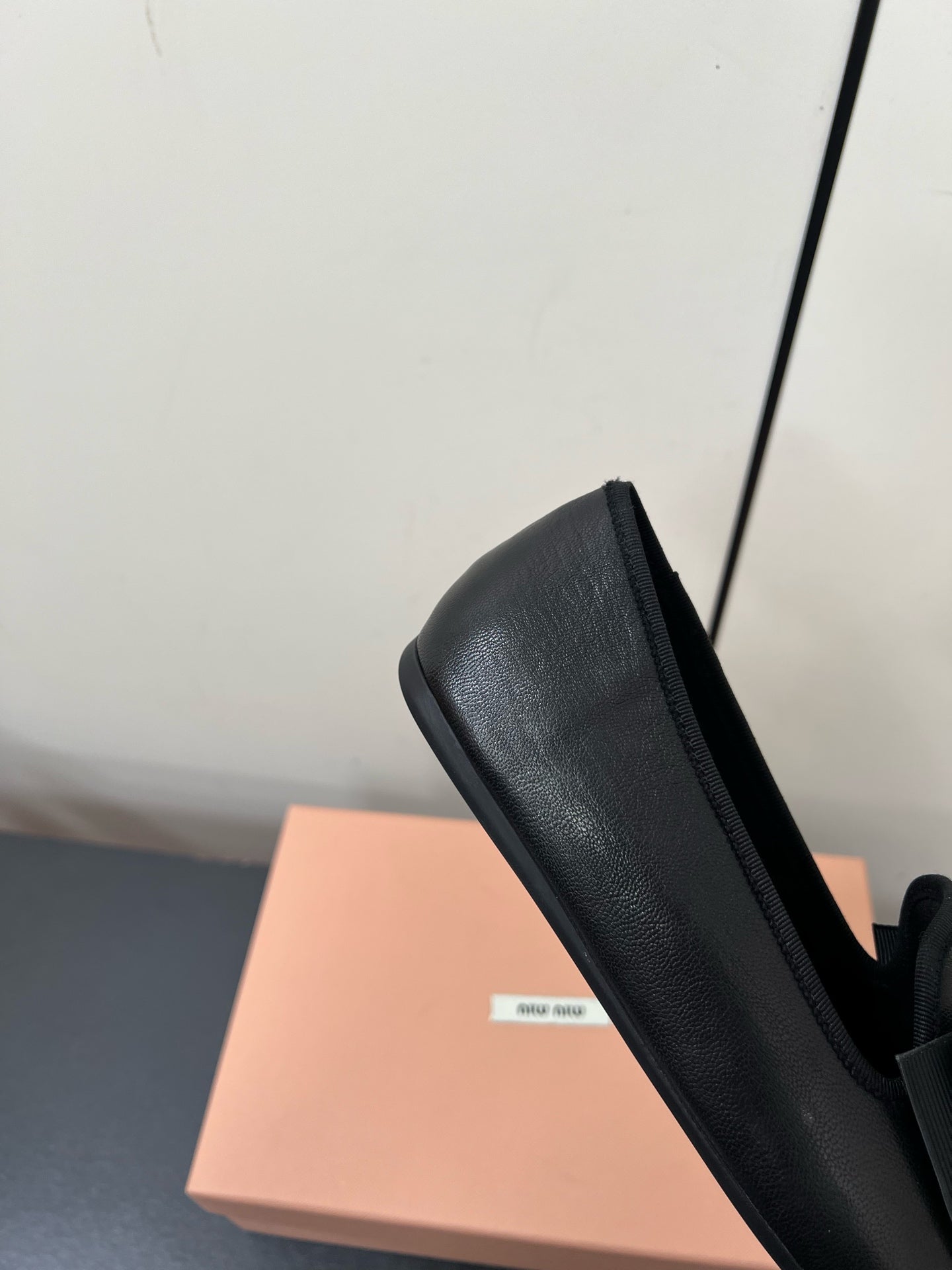 LOAFERS WITH BOW IN BLACK SHEEPSKIN