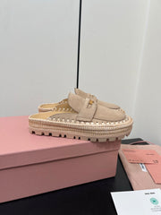 MULES SLIPPERS IN BEIGE SUEDE WITH GOLD COIN
