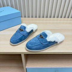 TRIANGLE LOGO FLATS IN AZURE BLUE SUEDE AND FUR LINING