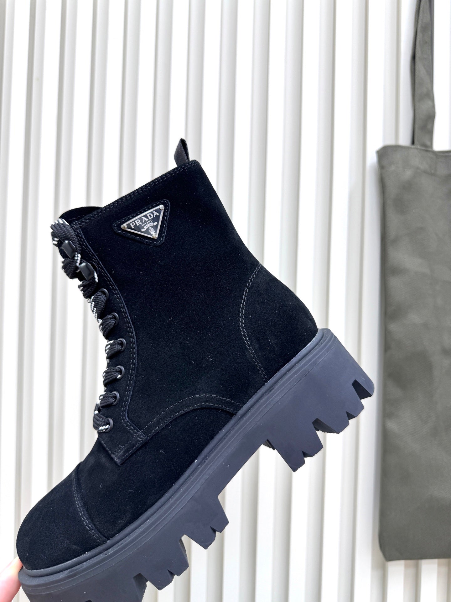 PRADA 25S MONOLITH BOOTS IN BLACK SUEDE