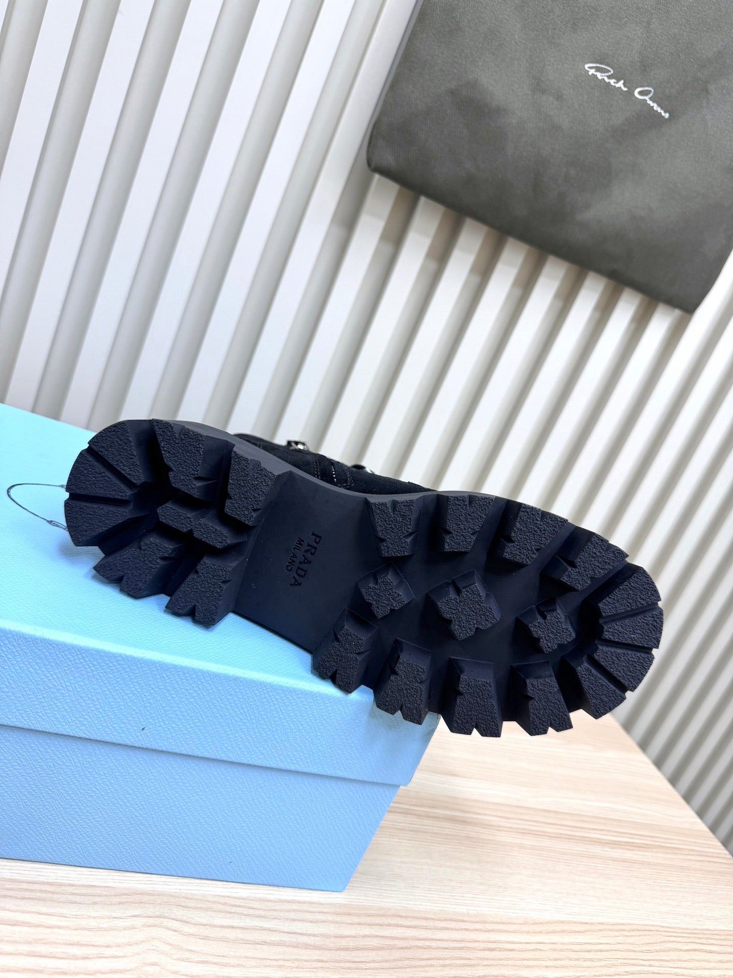 PRADA 25S MONOLITH BOOTS IN BLACK SUEDE