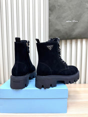 PRADA 25S MONOLITH BOOTS IN BLACK SUEDE