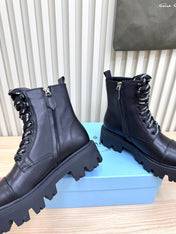 PRADA 25S MONOLITH BOOTS IN BLACK CALFSKIN