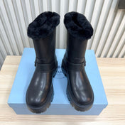 PRADA 25S MARTIN BOOTS IN BLACK CALFSKIN FUR-LINED