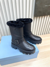 PRADA 25S MARTIN BOOTS IN BLACK CALFSKIN FUR-LINED