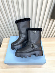 PRADA 25S MARTIN BOOTS IN BLACK CALFSKIN FUR-LINED
