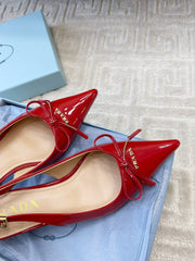 SLINGBACK PUMPS ATTACHED BOW IN PASSION RED GLOSSY CALFSKIN